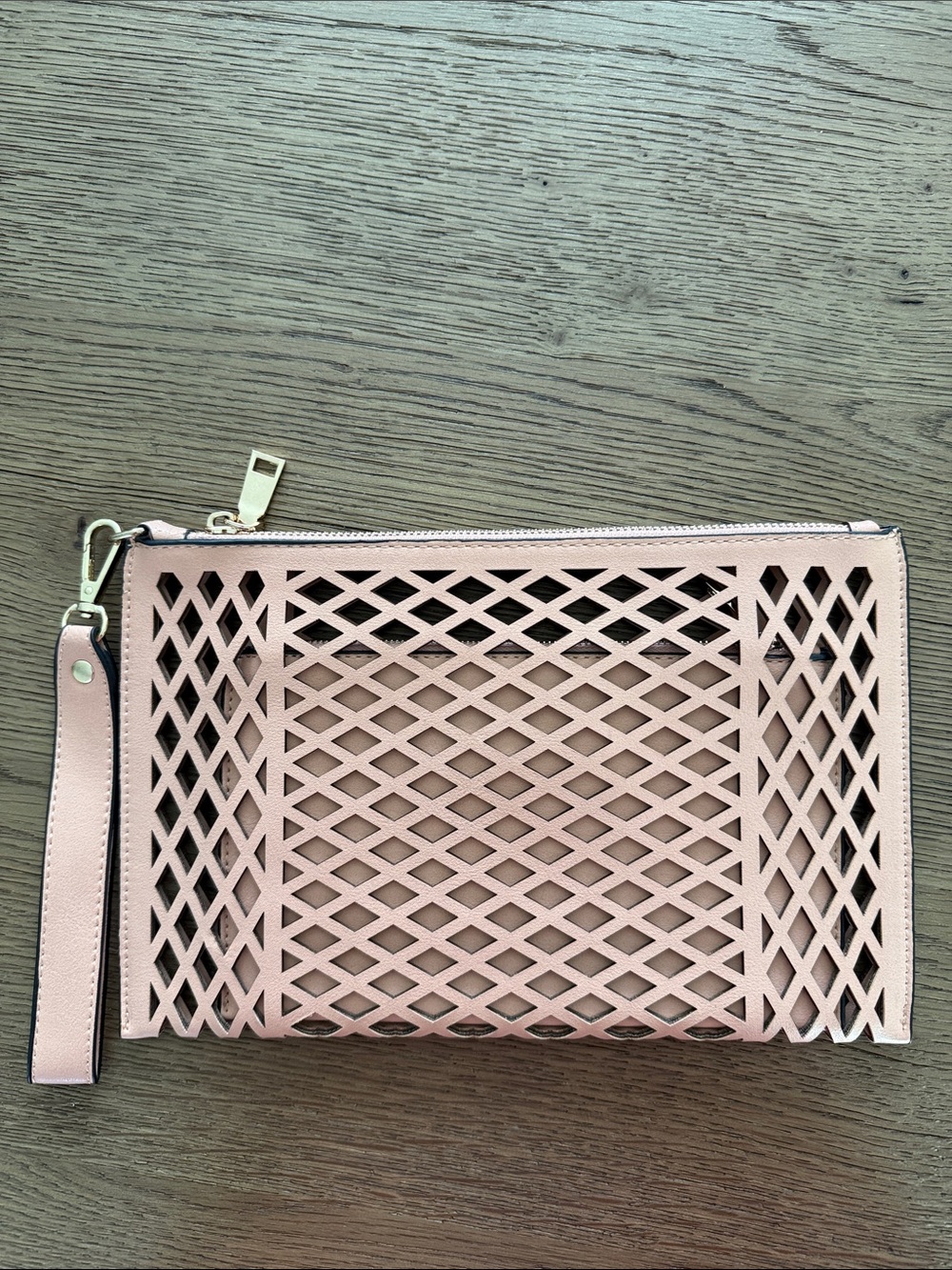 Madison West Peach Laser-Cut Wristlet Clutch with Gold Zipper